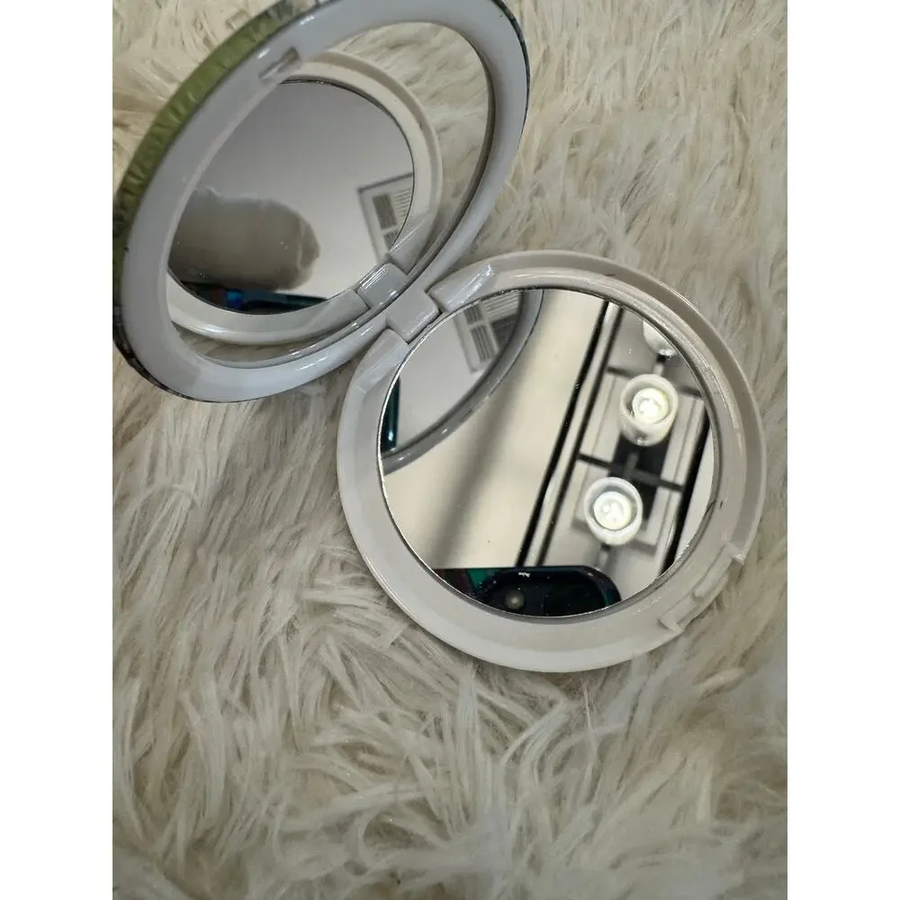 Winnie the Pooh compact mirror with Pooh, Tigger, Piglet, & Eeyore on mushrooms